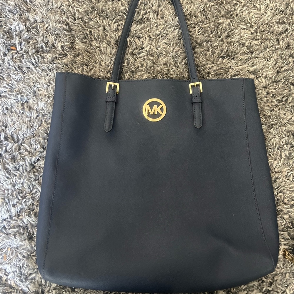 Michael Kors bag with matching wallet.